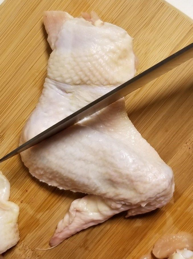 Cutting a chicken wing