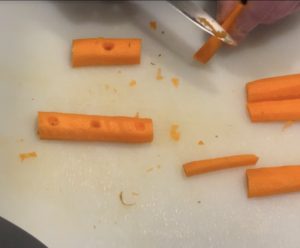 Carrot crossbar with three holes and base piece for veggie goal posts