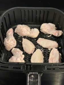 chicken wings in air fryer basket